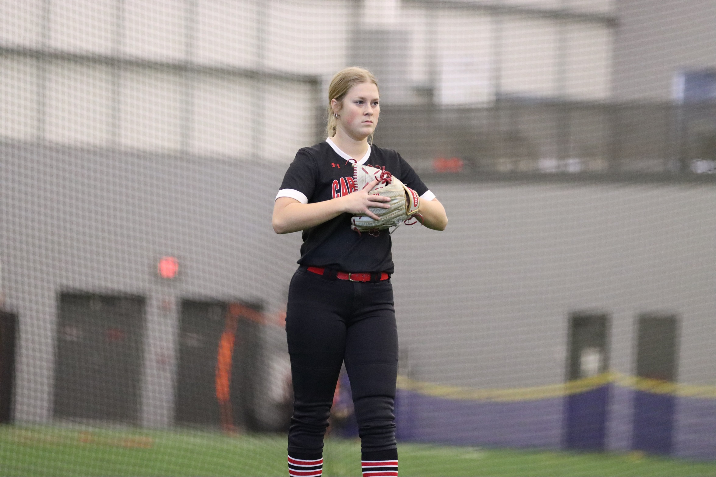Softball overpowers Harriers in two-game series
